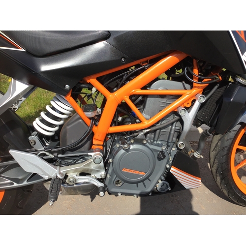 659 - KTM Duke 390 motorcycle. 2013. Runs and rides. 13700 miles. Comes with owners manual and service boo... 