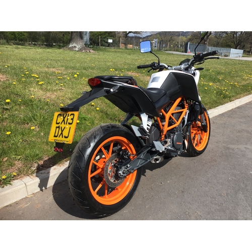 659 - KTM Duke 390 motorcycle. 2013. Runs and rides. 13700 miles. Comes with owners manual and service boo... 