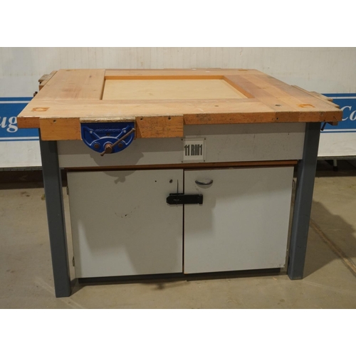 297 - 4 Sided work bench with 4 Record vices and cupboard under 4x4ftx31