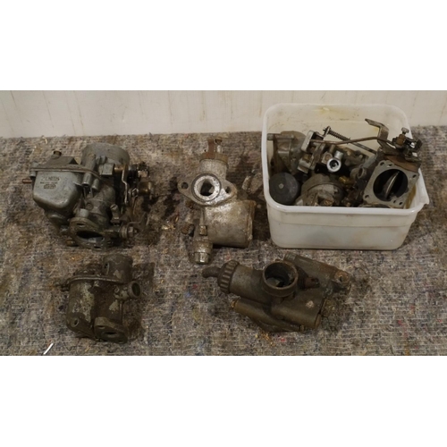 105 - 2 Boxes of assorted carburettor parts
