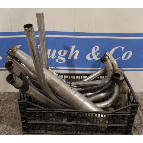 131 - Box of BSA twin exhaust parts