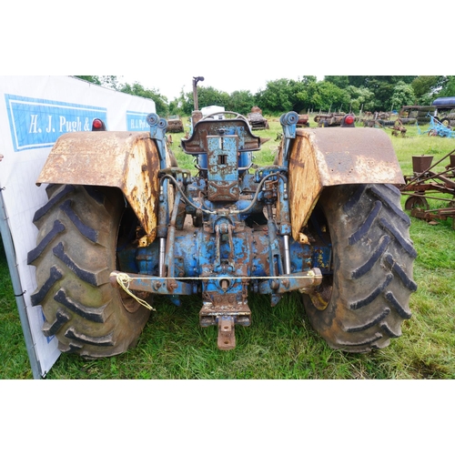 128 - County Supersix tractor. Hydraulic assister rams and cab. Runs & drives. SN.9K2 E10170