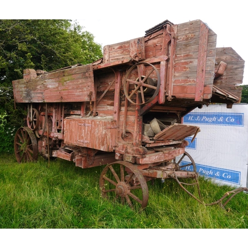 173 - Marshall threshing box on iron wheels