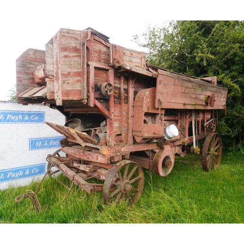 173 - Marshall threshing box on iron wheels