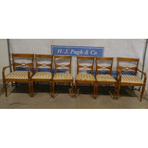 109 - Set of 6 beech dining chairs, 4 open and 2 carvers