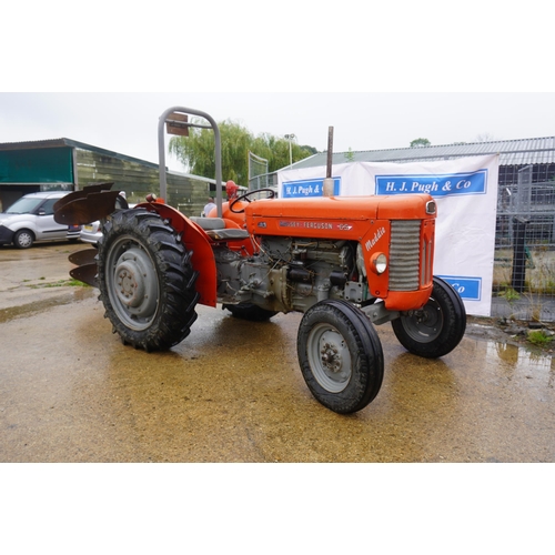 93 - Massey Ferguson 65 Mk2 Multi Power tractor, swinging drawbar, roll bar, trailer pipe, used on farm. ... 