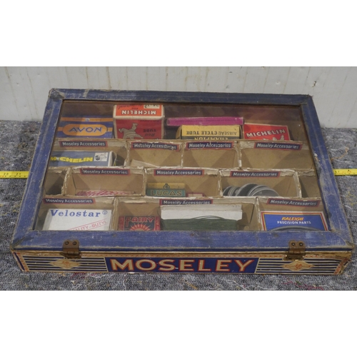 209 - Mosely cycle tyres cabinet and contents