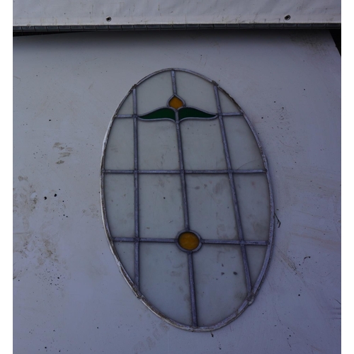 12 - Oval stain leaded window