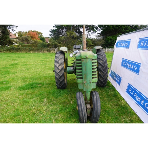 172 - John Deere Model B tractor. Runs and drives. Complete engine rebuild, brakes done, all lights work. ... 