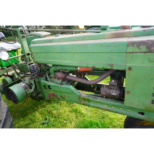 172 - John Deere Model B tractor. Runs and drives. Complete engine rebuild, brakes done, all lights work. ... 