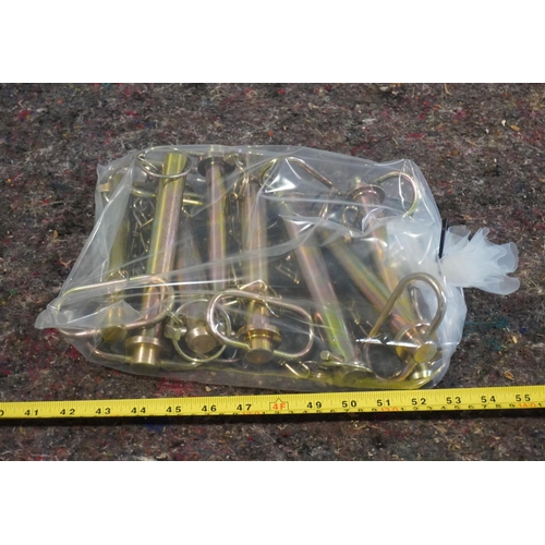 83 - 8 Tractor hitch pins. 3 Sizes