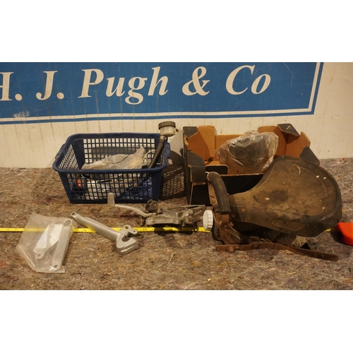 Box of Triumph Hinkley parts and box of seat parts and headlamp shells