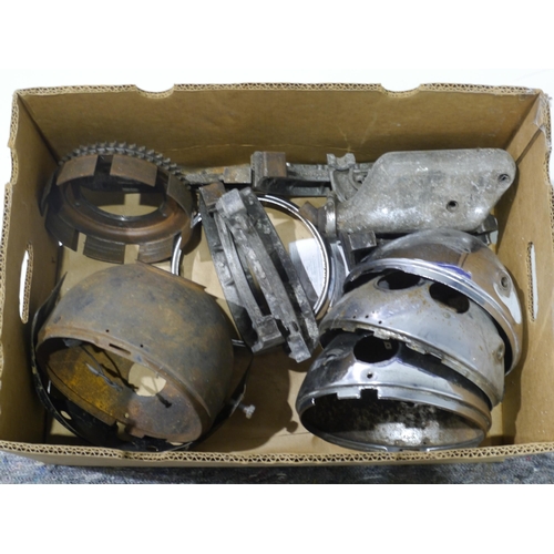 578 - Assorted headlamp shells and brake shoes