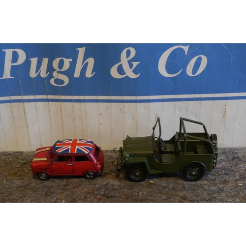 28 - 2- Tin plate car ornaments, hand painted