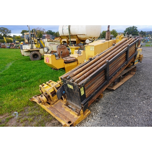 1113 - Vermeer 24x40 Navigator drilling rig with tank, pumps and heads, control box and manuals in office