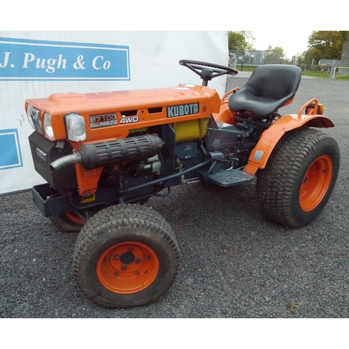 1355 - Kubota B7100 HST 4WD tractor. Grass tyres. Runs and drives, front tyre flat.