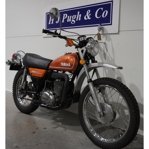 765 - Yamaha 250 enduro motorcycle. 250cc. 1974. Runs and rides well. New battery. Unrestored model, belie... 