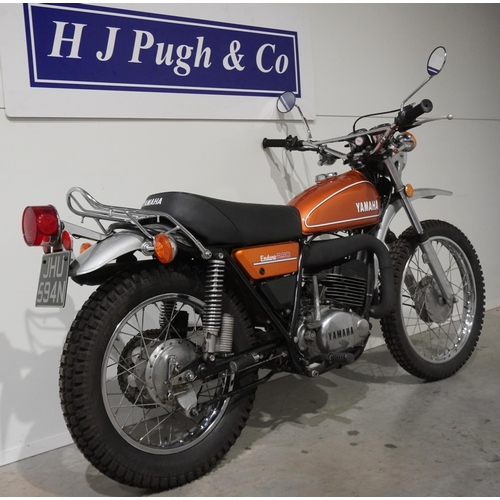 765 - Yamaha 250 enduro motorcycle. 250cc. 1974. Runs and rides well. New battery. Unrestored model, belie... 