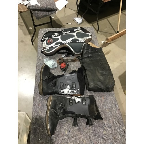 600 - Leather trousers 34” waist, boots size 10.5-11, Knox back body protector, assorted caps, old spanner... 
