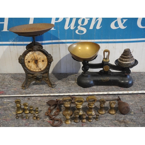 49 - 2 Sets of kitchen scales to include Boots the Chemist, The Family Scale and assorted brass weights