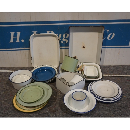 68 - Quantity of enamel kitchenware, plates, cooking tins, bowls etc