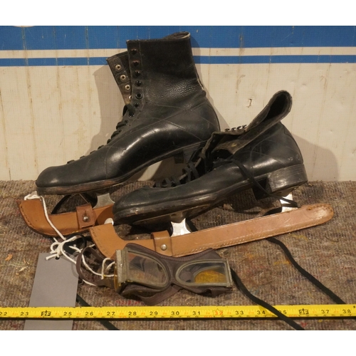 111 - Ladies ice skates and early motorcycle goggles