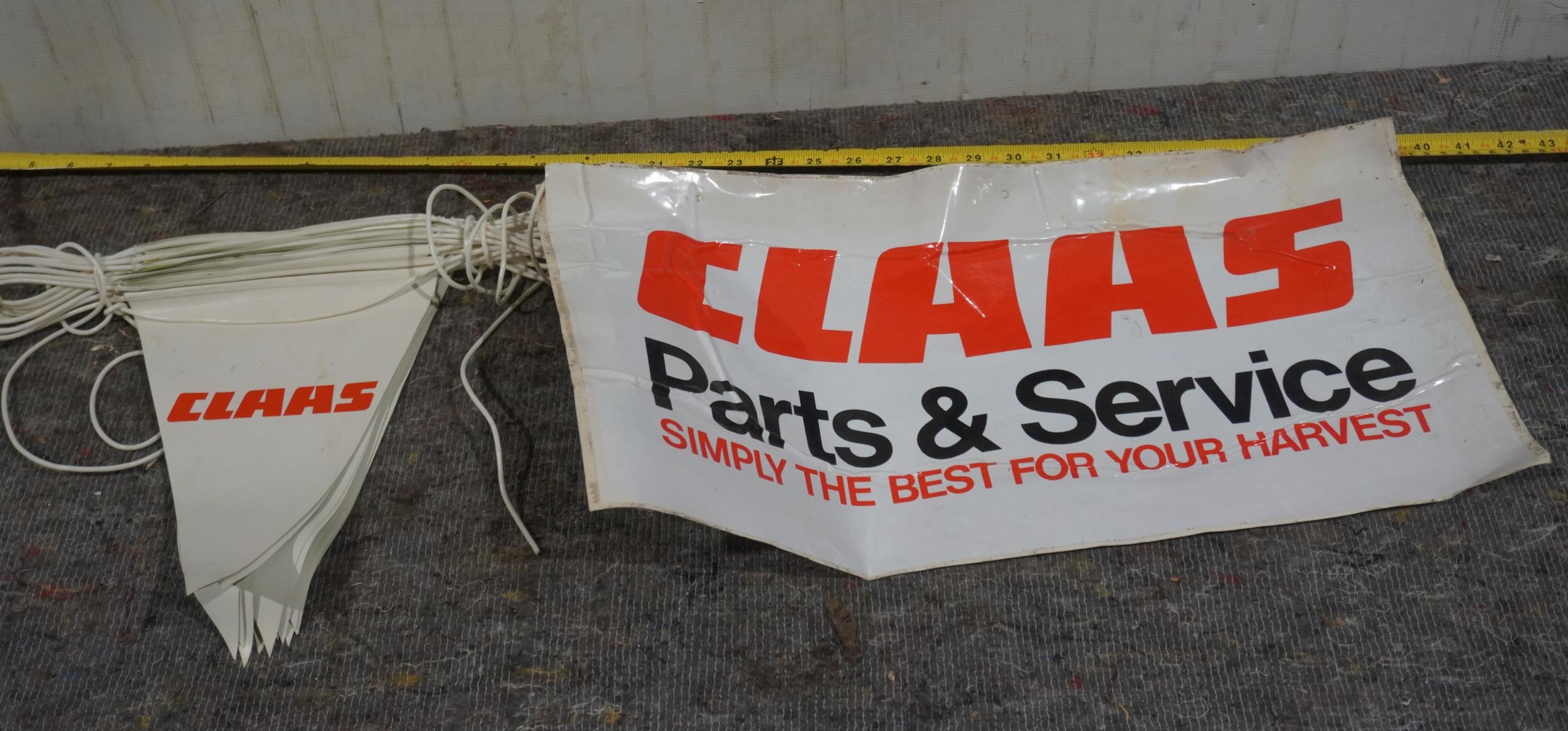 Claas parts and service sign and bunting