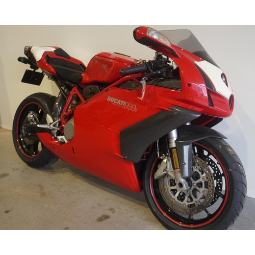 702 - Ducati 999s motorcycle. 2005. 998cc. Runs but needs new battery. Comes with folder of history and ha... 