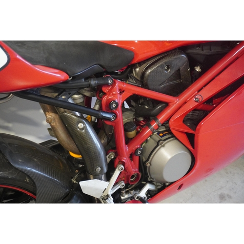 702 - Ducati 999s motorcycle. 2005. 998cc. Runs but needs new battery. Comes with folder of history and ha... 