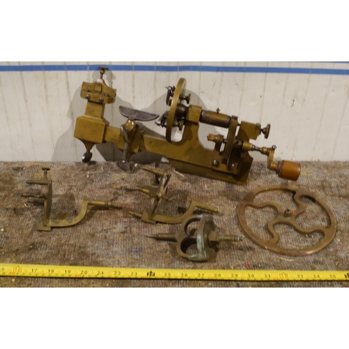 884 - Early bronze lathe and attachments