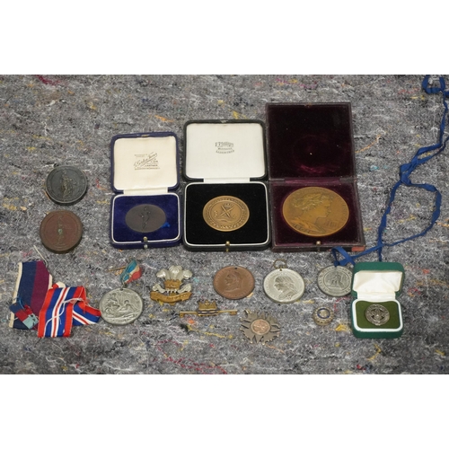 575 - Military medals and badges to include Comitatus vigniae medal, diamond jubilee medal and Scouts badg... 