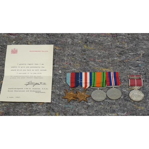 580 - WWII medal marked Staff Sargent John H Hopkins Reme with accompanying letter and other medals