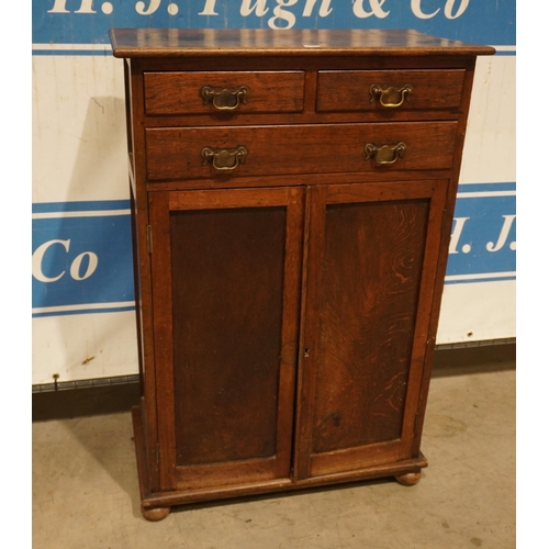 148 - Oak 2 door cupboard with drawers above 39x26