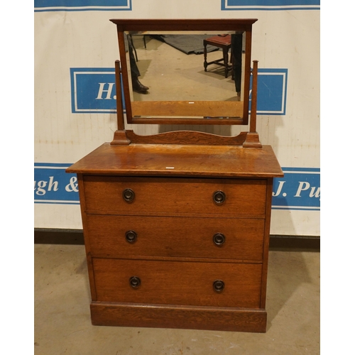 190 - Oak dressing chest of 3 long drawers with bevel edged mirror 36x28