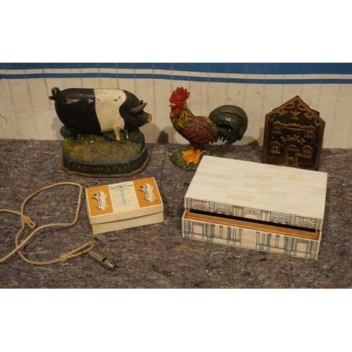 599 - 2 Cast iron doorstops, brass fronted money box etc