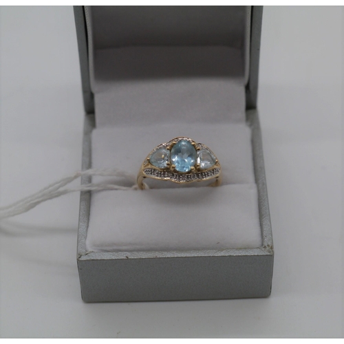 482 - 14ct Gold, diamond and aquamarine ring. Size Q