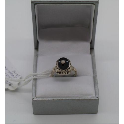 474 - Believed to be 14ct White gold, masonic seed pearl ring. Size J. No hallmark