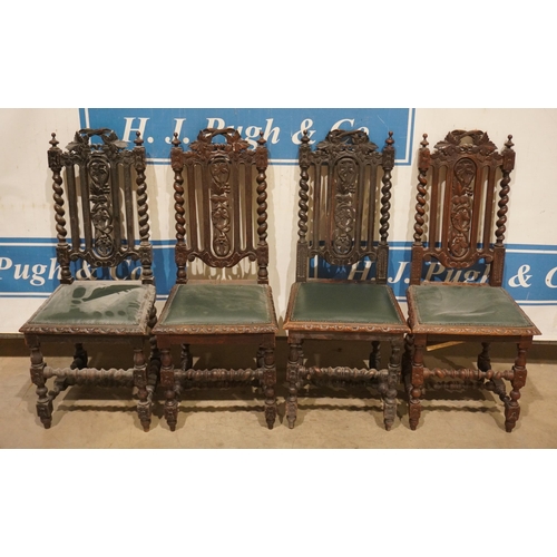 64 - 4 Heavily carved oak dining chairs