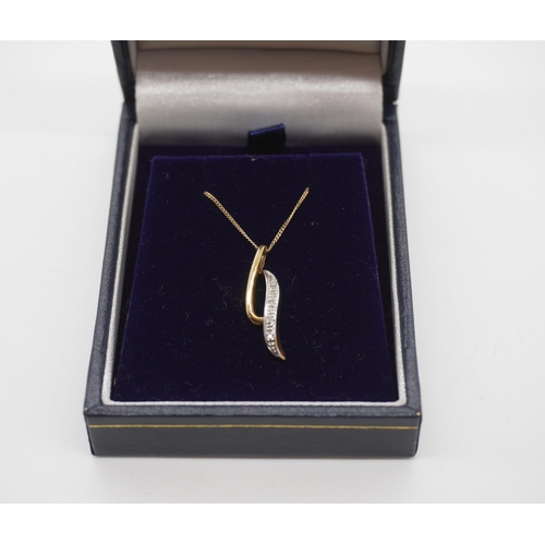 467 - 9ct Gold pendant with diamonds