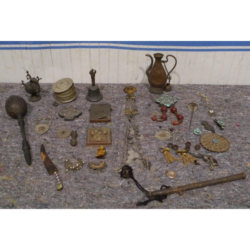 557 - Quantity of assorted early 20th century Tibetan artefacts