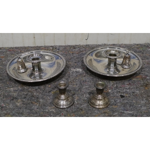 493 - Pair of silver plate candle holders, pair of silver candle sticks and silver decanter label