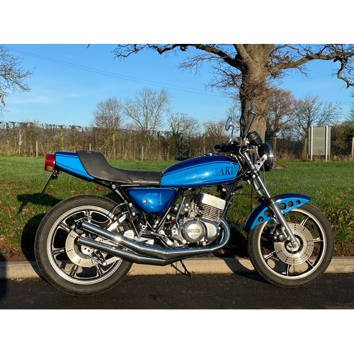 818 - Kawasaki KH400 motorcycle. 1976. Fitted with alloy wheels, triple disc and mono shock conversion. Al... 