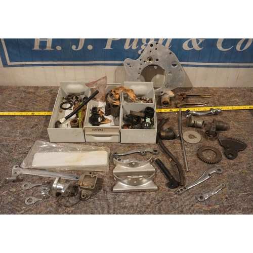 107 - Vincent levers, brake callipers, engine plate etc