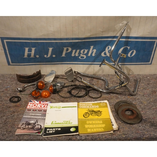 476 - Box of Norton Commando spares to include brake shoes, clutch plates, cables, bars etc