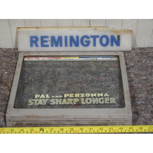 49 - Perspex sign - Remington and glass display cabinet lid
