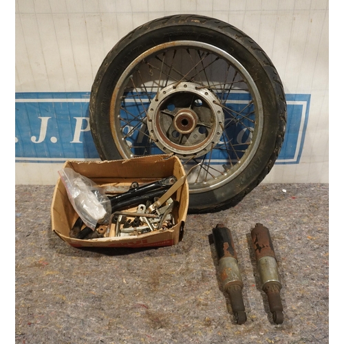 564 - Honda 550 spare wheel, motorcycle shocks, spares etc