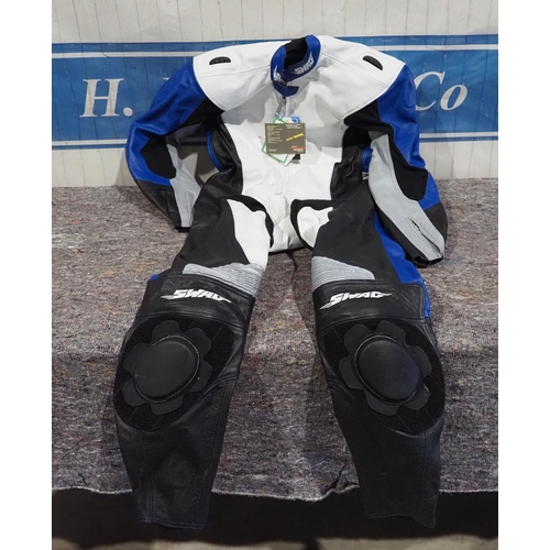 637 - 1 Piece blue and white racing leathers, Swag brand, size L, brand new in bag