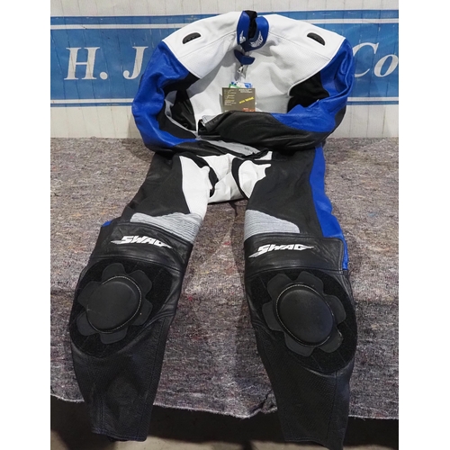 639 - 1 Piece blue and white racing leathers, Swag brand, size XXL, brand new in bag