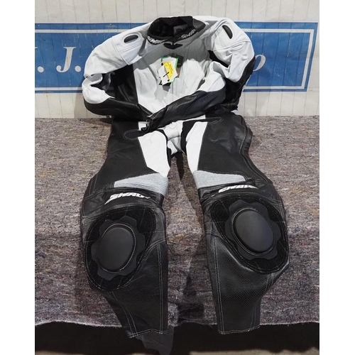 642 - 1 Piece black and white racing leathers, Swag brand, size XXL, brand new in bag