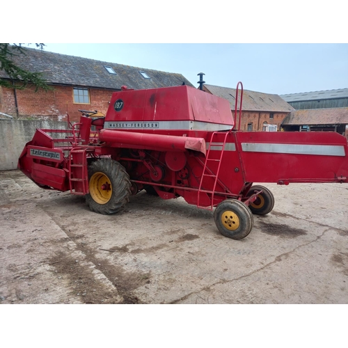 166 - Massey Ferguson 187 combine, telescopic header. reg. JEU 199J c/w operators manual